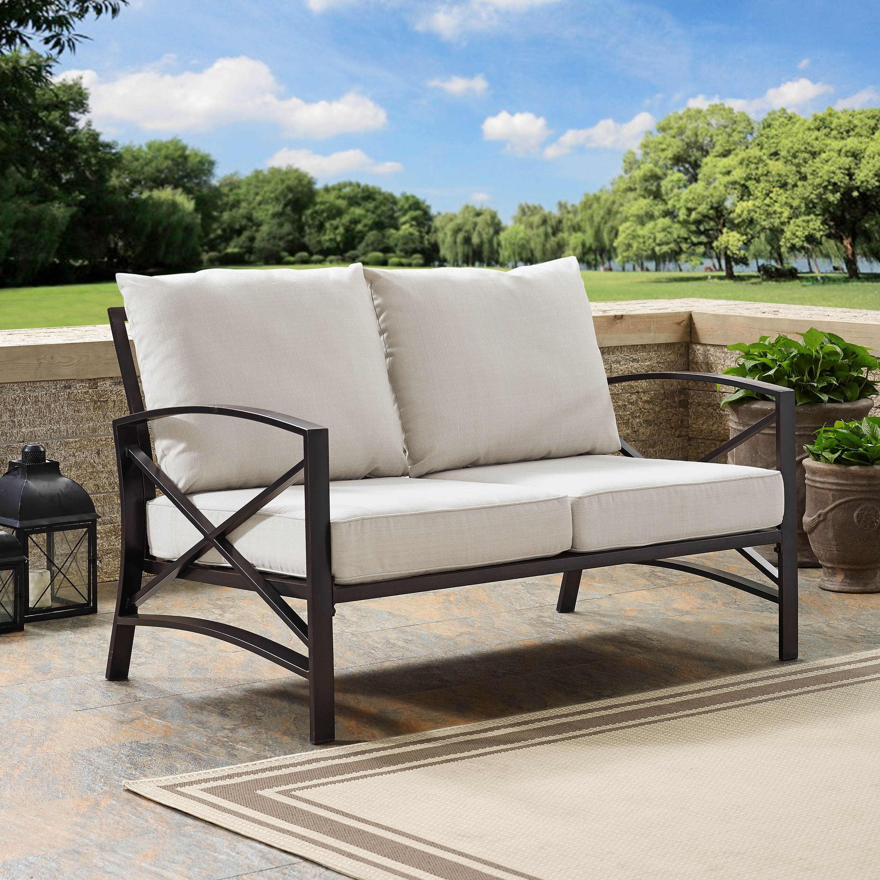 Kaplan Oiled Bronze Steel Outdoor Loveseat With Oatmeal Cushions - 54 W X 30.5 D X 32 H