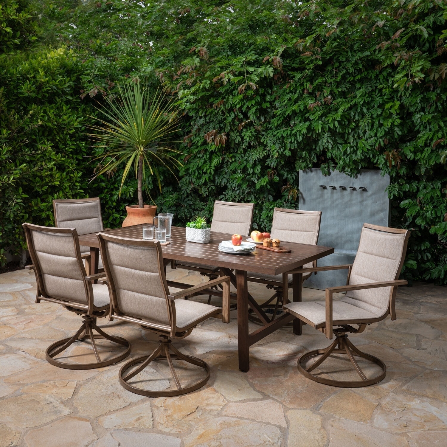Hanover Fairhope 7-piece Outdoor Dining Set With 4 Sling Chairs  2 Sling Swivel Rockers And A 74-in. X 40-in. Trestle Table  Tan