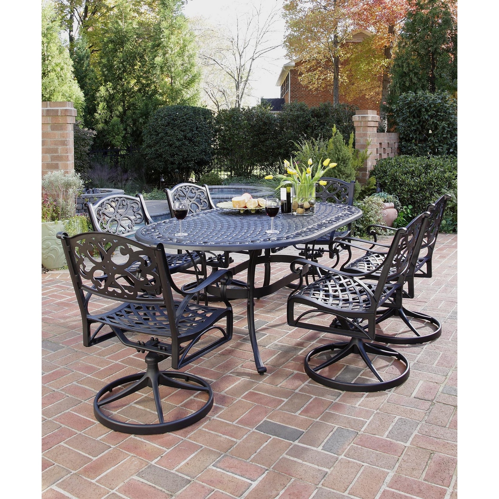 Sanibel Black 7-piece Outdoor Dining Set  With Table and 6 Swivel Rocking Chairs