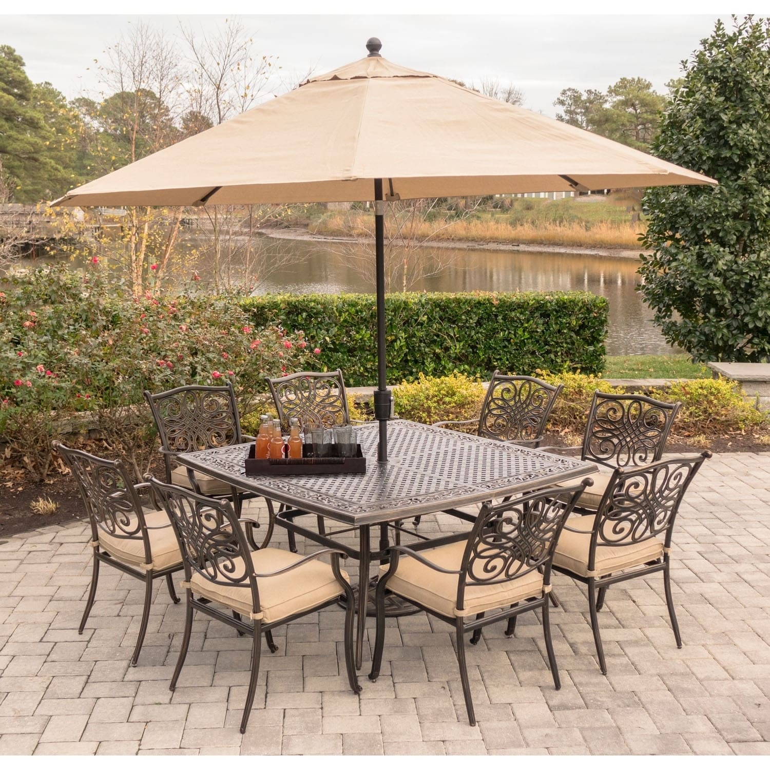 Hanover Traditions 9-piece Dining Set In Tan With Square 60 In. Cast-top Dining Table  11 Ft. Table Umbrella  And Umbrella Base